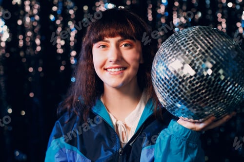 Preview: Young sporty woman 80 and 90's style. 90s fashion positive girl at night club disco party disco ball