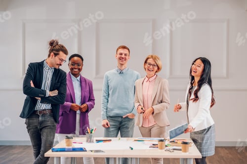 Preview: Multiracial business group of people having a meeting in an office