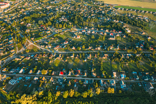Preview: Aerial View Of Vegetable Gardens In Small Town Or Village. Skyline In Summer Evening. Village Garden