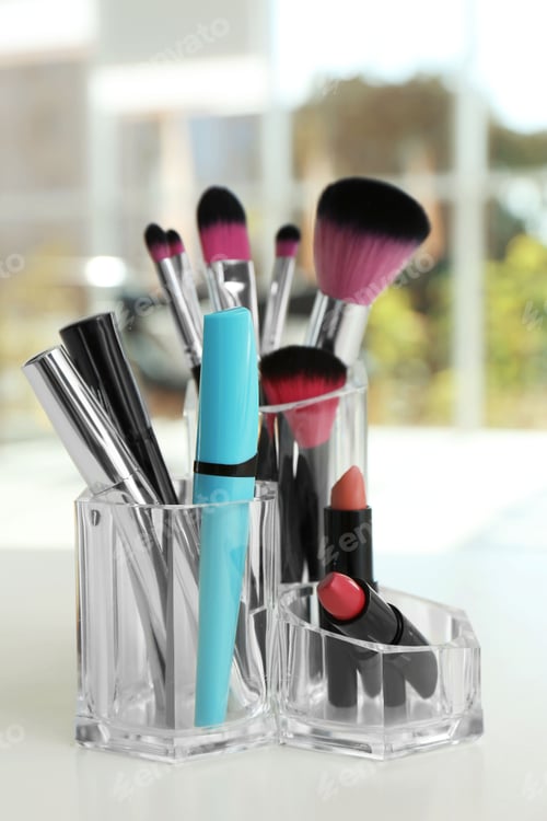 Preview: Organizer with cosmetic products for makeup on table indoors