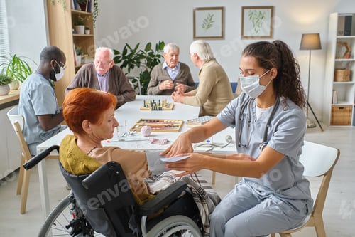 Preview: Nurse measuring the pressure to senior people