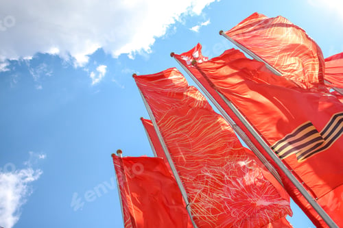 Preview: Red flags with george ribbon at Victory day in Russia