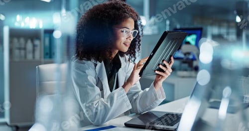 Preview: Tablet, laptop and woman scientist in lab working on medical research, project or experiment. Scien