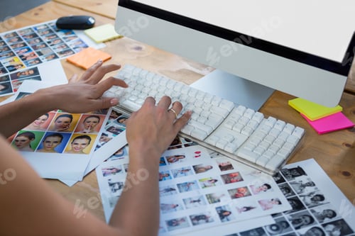 Preview: Woman working on desktop pc