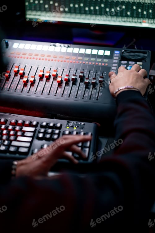 Preview: close up the recording room dark with neon lighting in the studio the sound engineer works with the