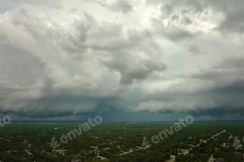 Preview: Landscape of dark ominous clouds forming on stormy sky before heavy thunderstorm