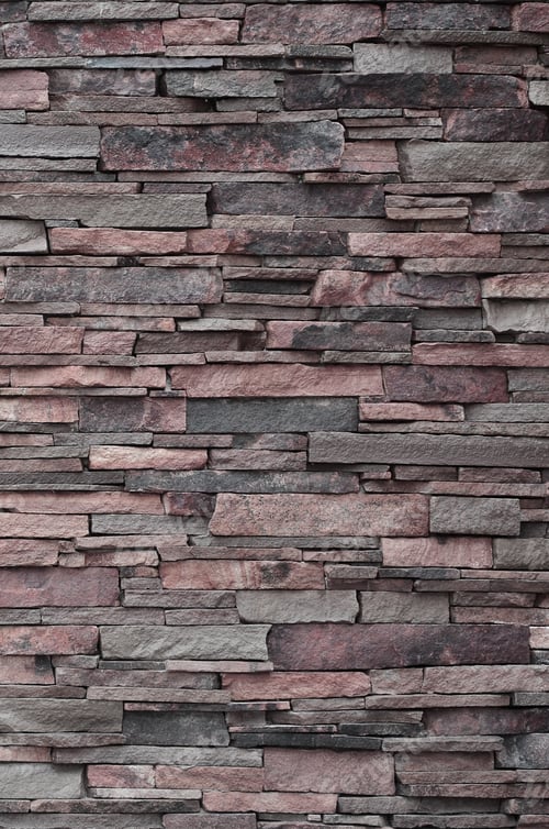 Preview: Texture of a stone wall from long and rough stones of different sizes and tones