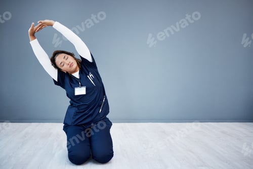 Preview: Tired nurse, stretching or arms up on hospital mockup, clinic backdrop or wall mock up in wellness