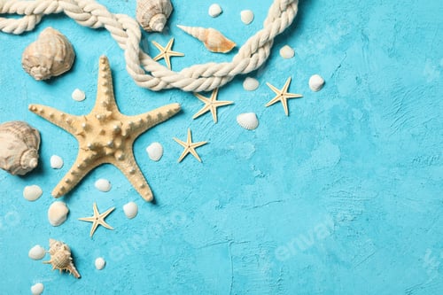 Preview: Starfish, rope and seashells on blue background, space for text