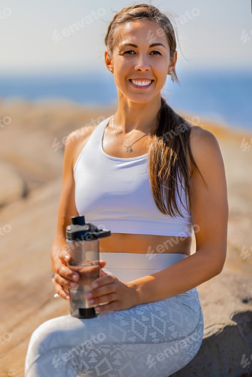 Preview: Confident Female Resting After Exercising Outdoors