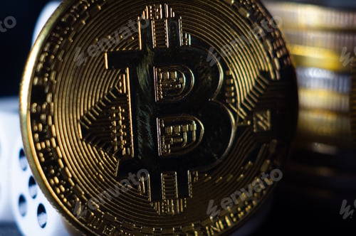 Preview: Coin with the Bitcoin on it on a blurred background