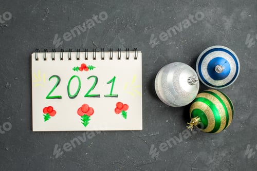 Preview: top view christmas tree toys with writing on dark background xmas color photo new year holiday