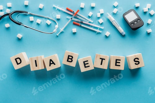 Preview: diabetes lettering made of wooden cubes with medical equipment on blue background