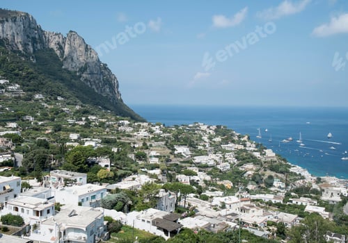 Preview: Breathtaking view of a coastal village nestled on a hillside
