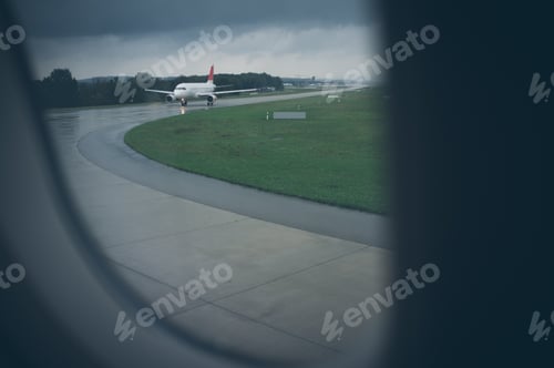 Preview: Airplane on the Runway Viewed Through Airplane Window