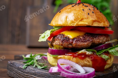 Preview: Sandwich with beef burger, tomatoes, cheese, pickled cucumber, red onions and ketchup. Cheeseburger