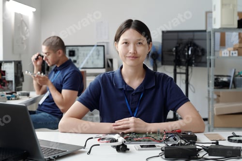 Preview: Portrait of Woman Smiling in Technology Lab Setting