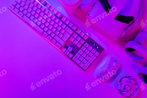Preview: Keyboard with mouse and headphones on desk