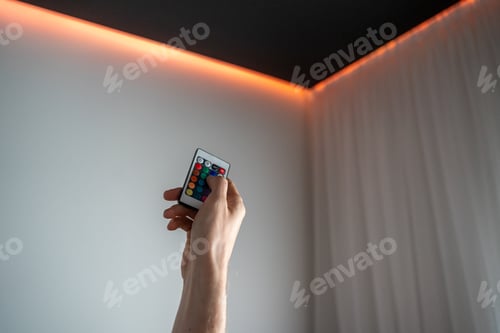 Preview: Hand with led lighting remote control