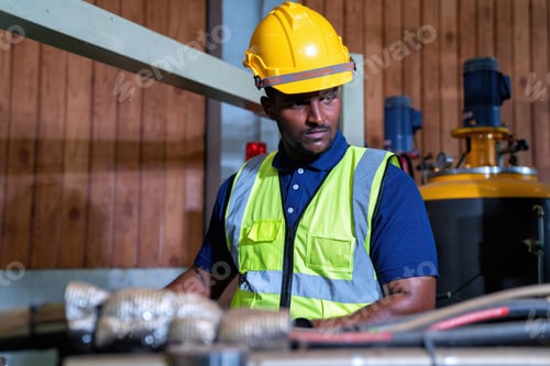 Preview: Man engineering operator wearing uniform Quality control maintenance,checking process in factory