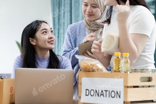 Preview: Diverse volunteers discussing donation efforts at a community event