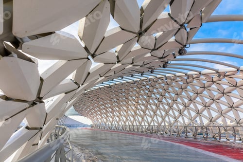 Preview: Modern architectural urbanistic Atyrau fish bridge across Ishim river. Pedestrian bridge with