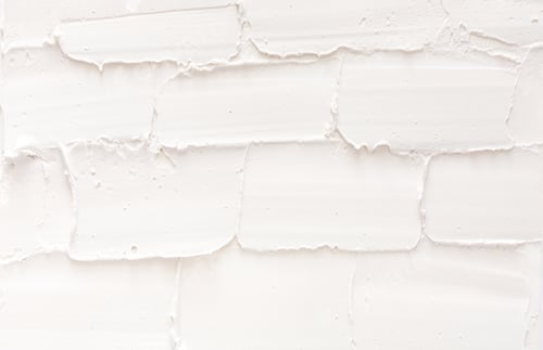 Visualização: Parede de tijolo branco texturizado, padrão de estuque