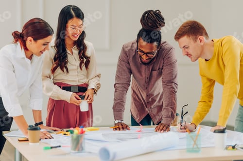 Preview: Multiracial team of engineers or architects having a meeting in an office