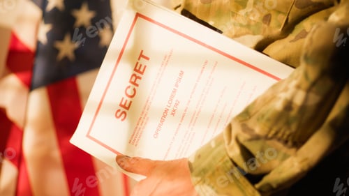 Preview: American soldier enters office with folder