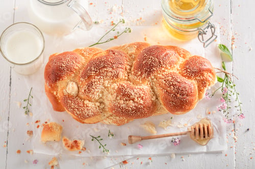 Preview: Delicious golden challah with milk and honey.