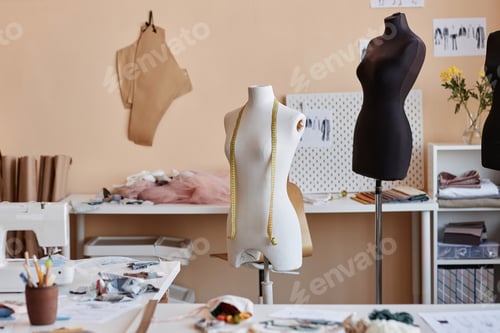 Preview: Part of spacious workshop of craftsperson with sewing equipment and mannequins