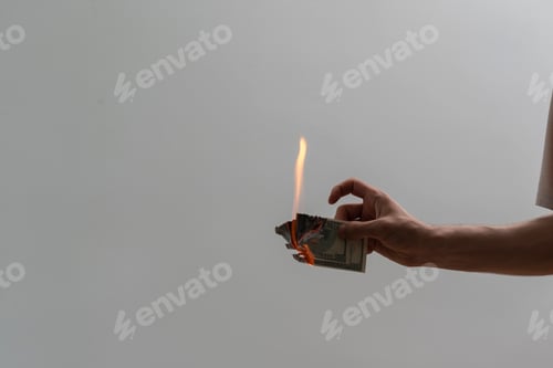 Preview: dollar bill is burning in flames, finance economy crisis