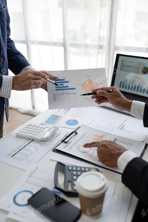 Preview: business people meeting in the office Calculate company tax and investment income Strategic planning