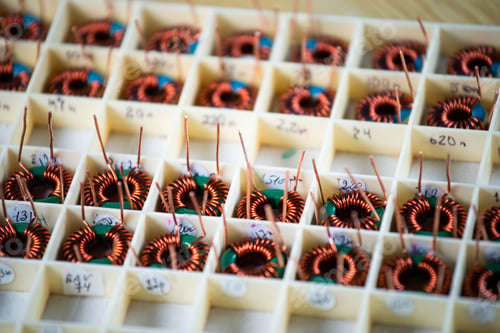 Preview: Many twisted copper coils lie