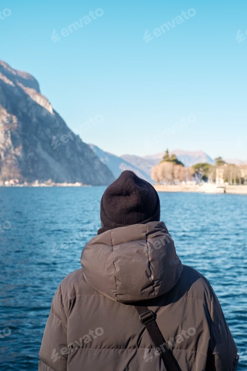 Preview: Tourist enjoys the scenic view of Lake Como from Lecco