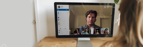 Preview: Businesswoman having a video conference with colleagues during coronavirus quarantine