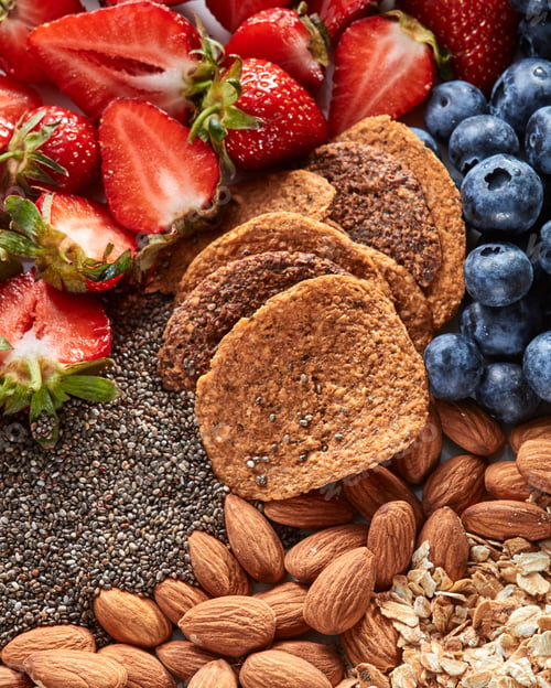 Preview: Fresh organic ingredients for dietary homemade natural breakfast - berries, granola, nuts, chia