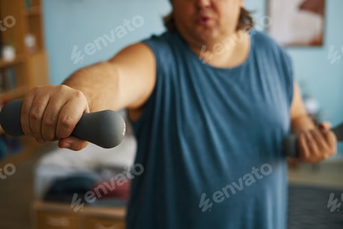Preview: Exercising with Dumbbells in Brightly Lit Room