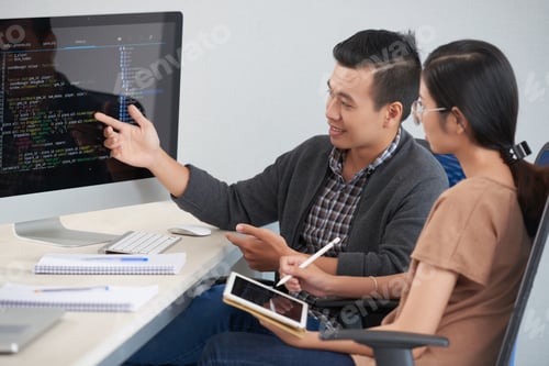 Preview: Developers discussig code
