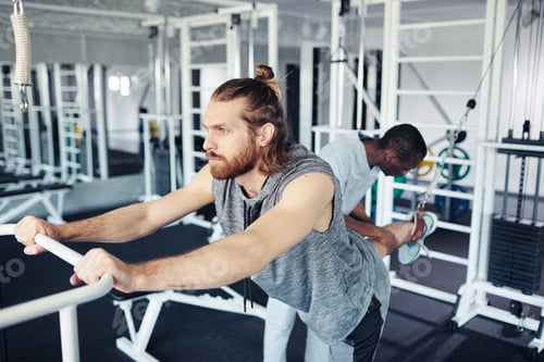 Preview: Patient doing stretching exercises in gym