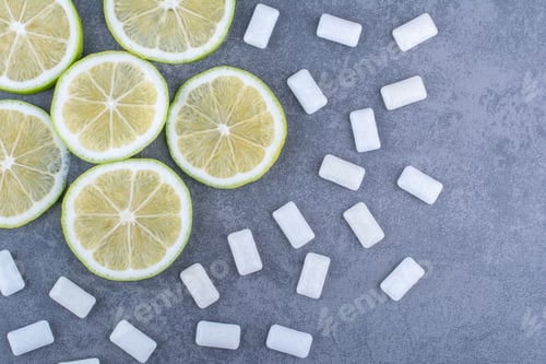 Preview: Lemon Slices and White Chewing Gum on Gray