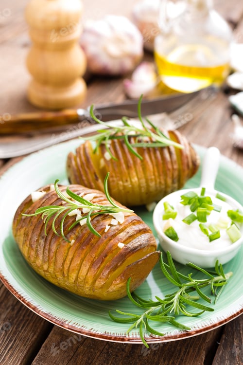 Preview: Baked potato. Potato oven baked with garlic and rosemary