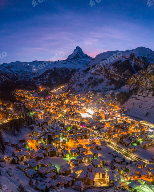 Preview: Zermatt Town and Matterhorn Mountain at Winter Night. Swiss Alps, Switzerland. Aerial View