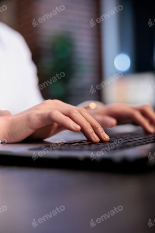 Preview: Close up of financial company employee analyzing accounting data and project state while sitting at