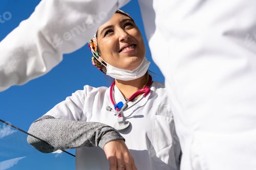 Preview: Smiling Woman Health Professional Wearing Mask and Stethoscope