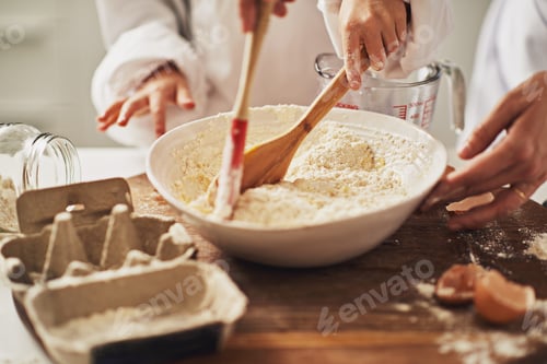 Preview: Lets get cooking. Cropped shot of a mother and her son baking in the kitchen.