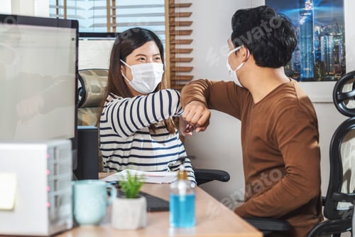 Preview: Professionals Bump Elbows Wearing Masks in the Office