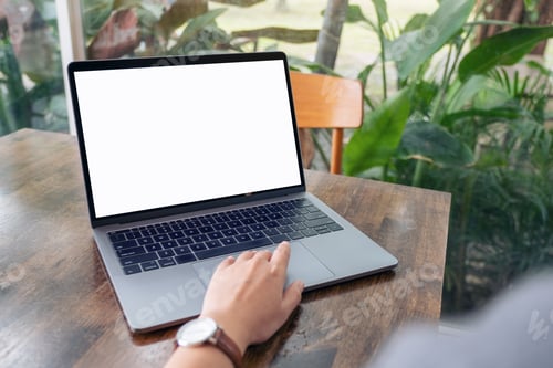 Preview: a woman using and touching laptop touchpad with blank white desktop screen
