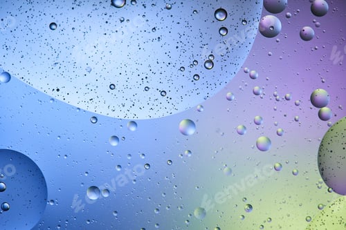 Preview: Beautiful abstract background from mixed water and oil in blue, purple and green color