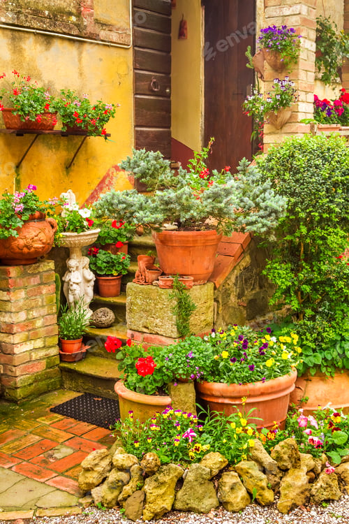Preview: Beautiful porch decorated with flowers in the countryside, Italy